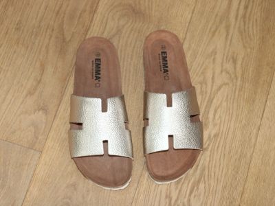 Mules plates en cuir doré Emma